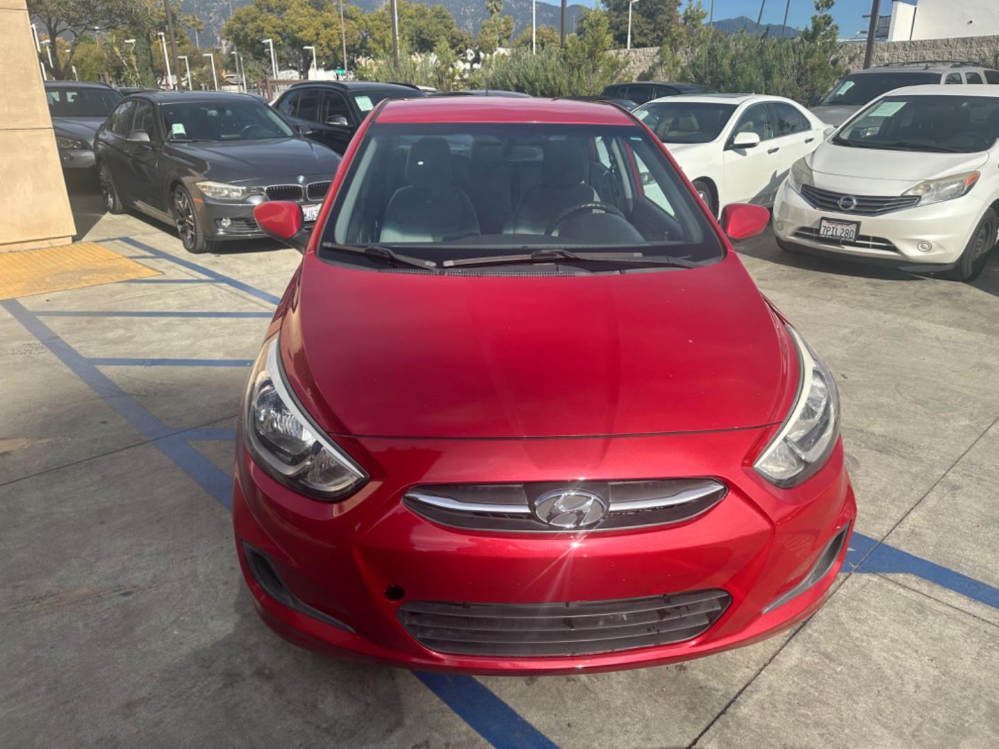 2015 Red /Gray Hyundai Accent GLS Sedan 4D (KMHCT4AE2FU) with an 4-Cyl, 1.6L engine, Auto, 6-Spd w/Overdrive transmission, located at 30 S. Berkeley Avenue, Pasadena, CA, 91107, (626) 248-7567, 34.145447, -118.109398 - The 2015 Hyundai Accent 4-Door Sedan stands as a testament to Hyundai's commitment to quality, efficiency, and value. Located in Pasadena, CA, our dealership specializes in providing a wide range of used BHPH (Buy Here Pay Here) cars, trucks, SUVs, and vans, including the remarkable Hyundai Accent. - Photo#22